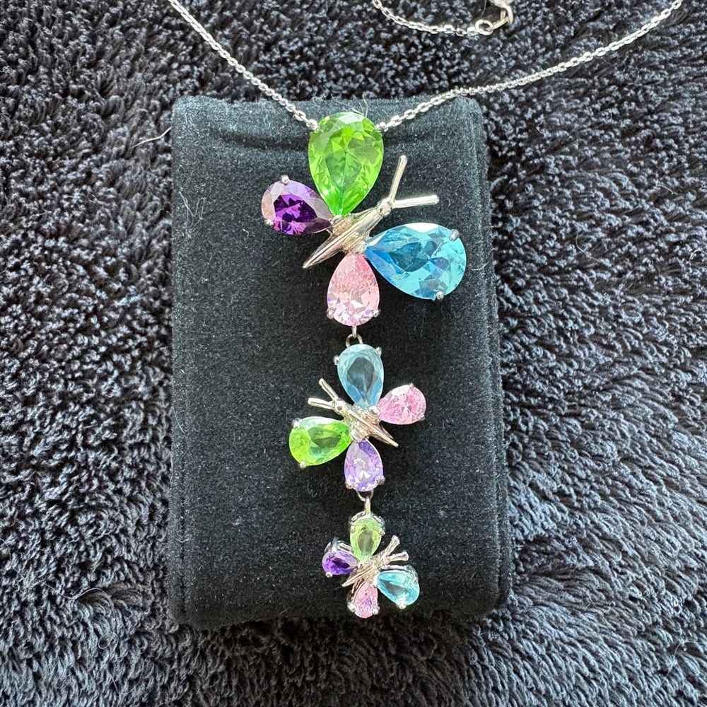 Sterling Silver Butterfly Necklace. 
Pink, Purple, Blue and Green Stones.